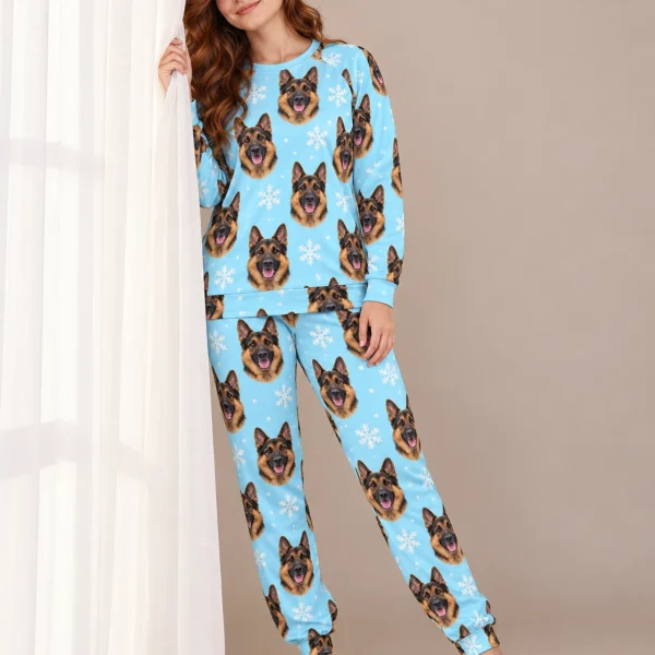 Woman posing in matching German shepherd pajamas with black-and-tan German Shepherd faces — MyDogPics