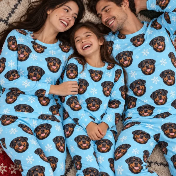 Woman and her family in matching matching rottweiler pajamas with black-and-mahogany Rottweiler faces — MyDogPics