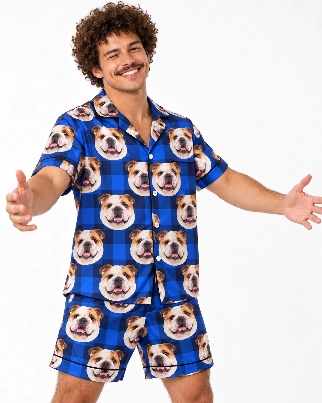 Men’s English Bulldog Pajama Shorts – Front View, Blue Plaid | MyDogPics Man wearing mens english bulldog pajama shorts covered in white-and-fawn English Bulldog faces — MyDogPics
