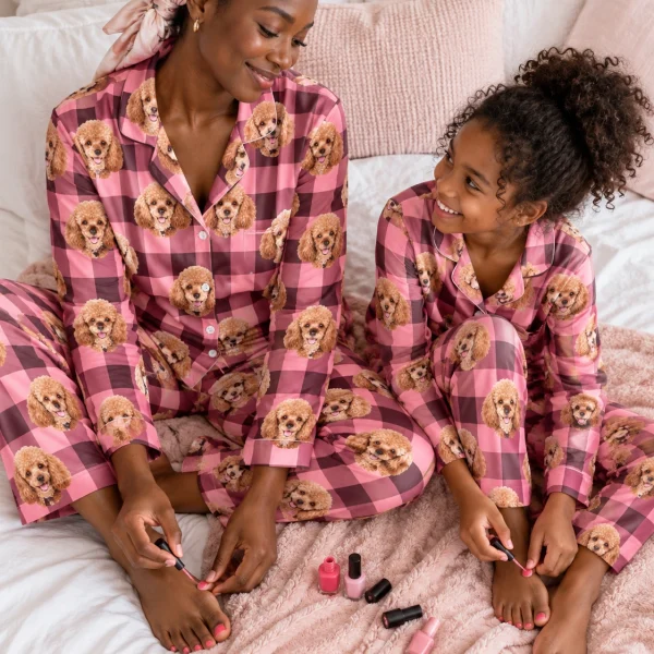 Woman and her daughter in matching poodle mom pajamas with apricot Poodle faces on pink plaid fabric — MyDogPics
