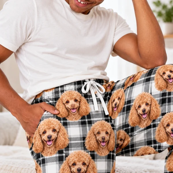 Close-up of the poodle pajama pants print: apricot Poodle faces on white plaid fabric — MyDogPics