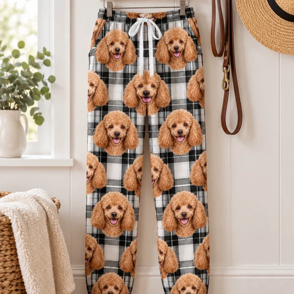 Poodle pajama pants pants hanging up, covered in apricot Poodle faces — MyDogPics
