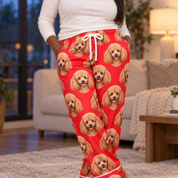 Woman posing in poodle Valentine pajamas, apricot Poodle faces on red satin — MyDogPics