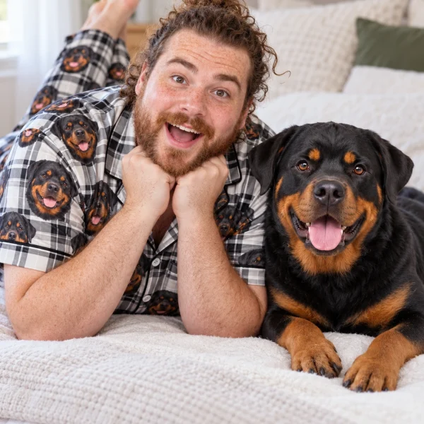 Man in rottweiler dad pajamas with his Rottweiler — MyDogPics