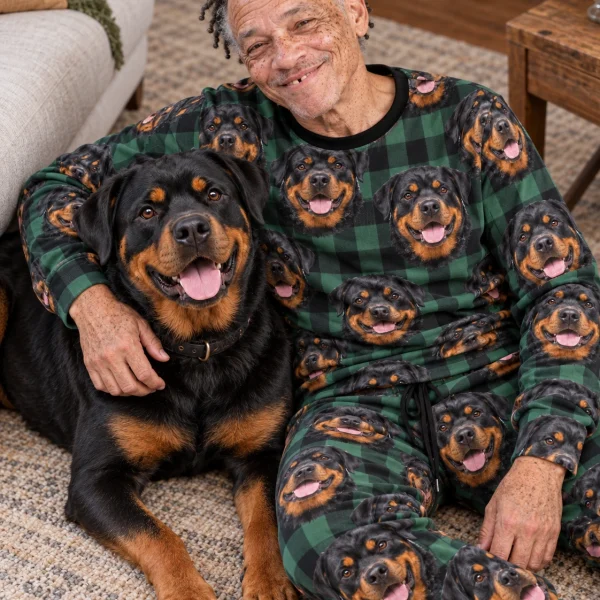 Man in a rottweiler pajama set with his Rottweiler — MyDogPics