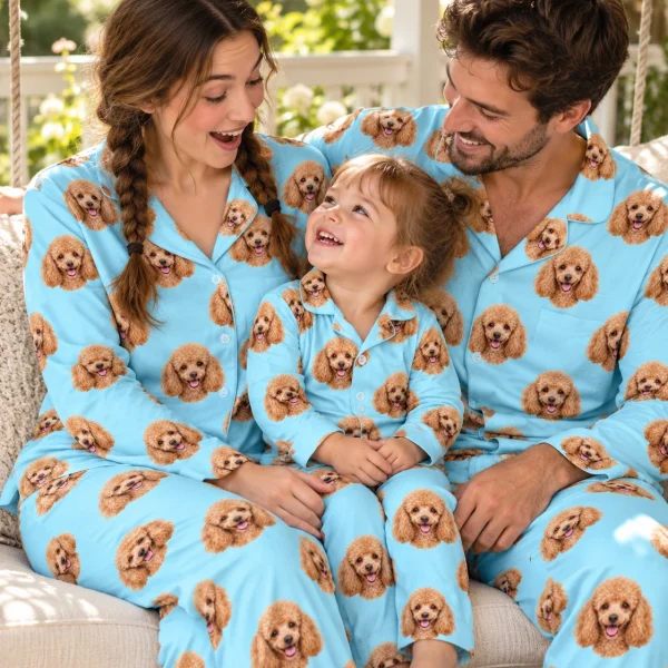 Woman and her family in matching standard poodle pajamas with apricot Poodle faces on light blue fabric — MyDogPics