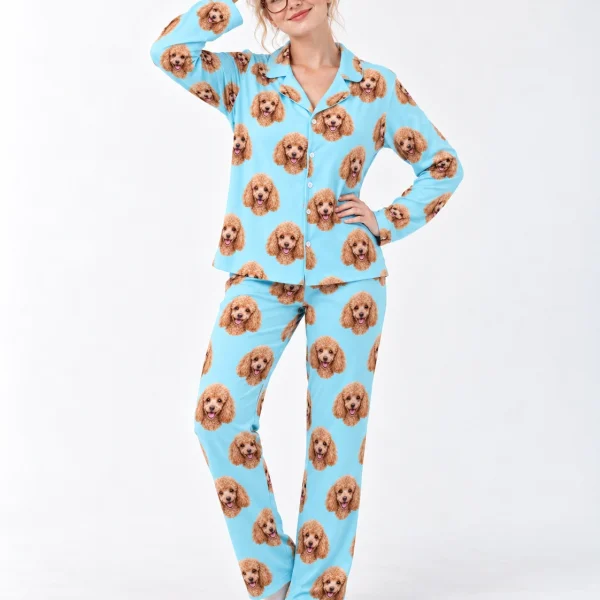 Woman wearing standard poodle pajamas covered in apricot Poodle faces on light blue fabric — MyDogPics